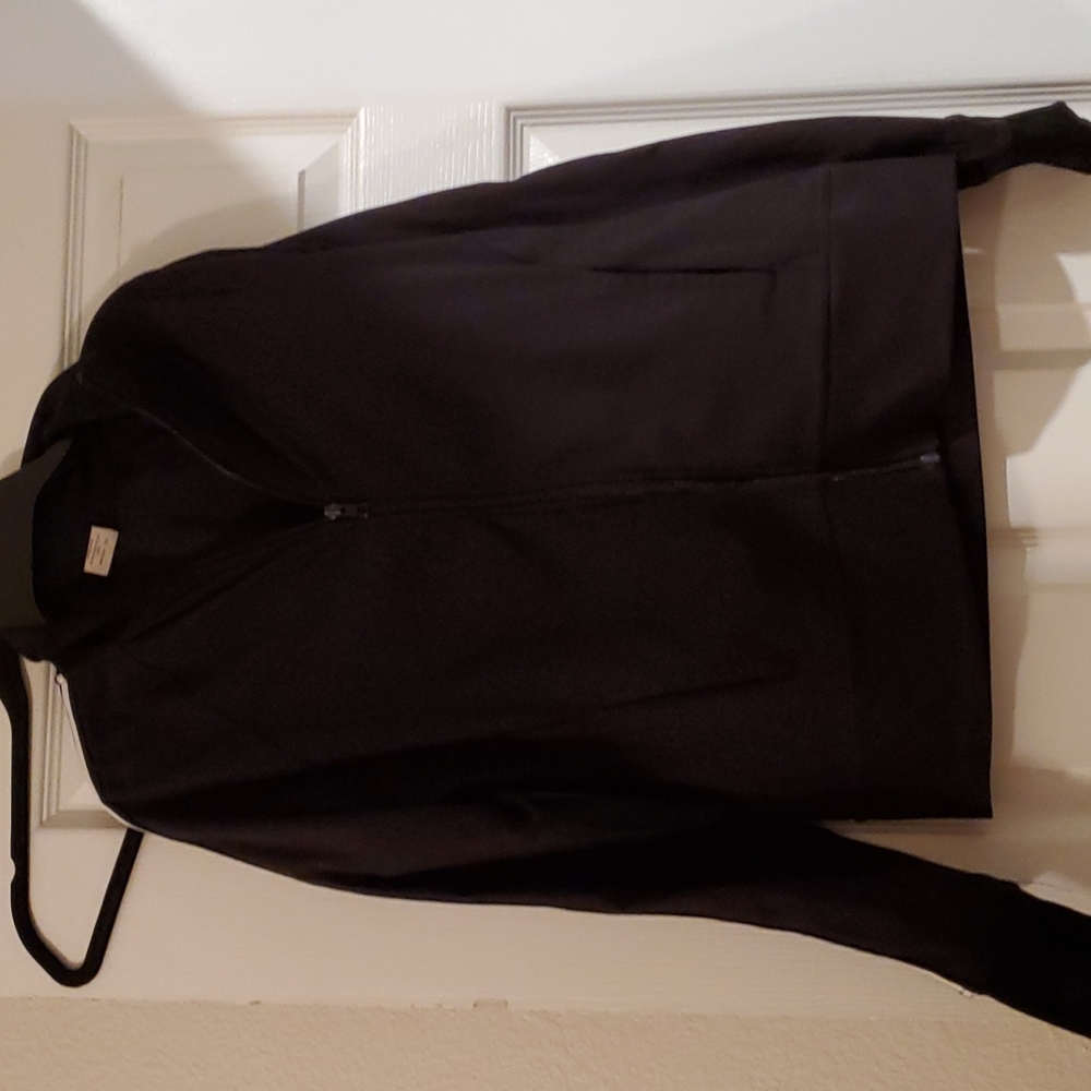 Size Small 4-6 black white strips on the arms